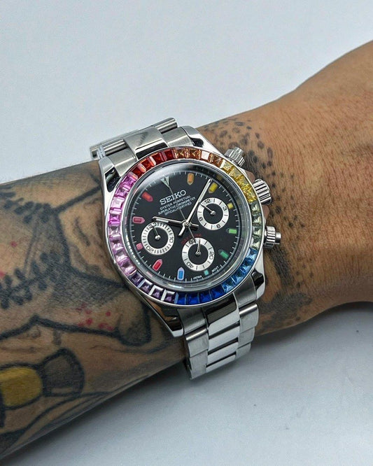 "Seiko Mod Rainbow Daytona on wrist showing its size, fit, and vibrant rainbow bezel in natural lighting."